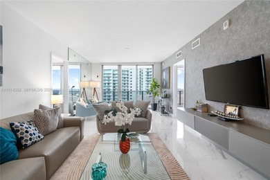 Welcome to Unit 4309 at Aria on the Bay -- a bright and spacious