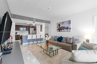 Welcome to Unit 4309 at Aria on the Bay -- a bright and spacious