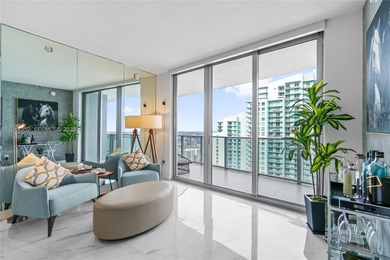 Welcome to Unit 4309 at Aria on the Bay -- a bright and spacious
