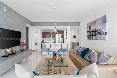 Welcome to Unit 4309 at Aria on the Bay -- a bright and spacious
