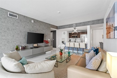 Welcome to Unit 4309 at Aria on the Bay -- a bright and spacious