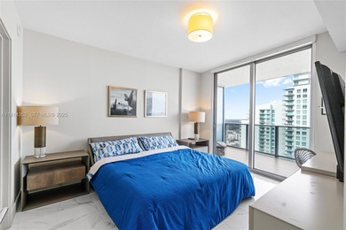 Welcome to Unit 4309 at Aria on the Bay -- a bright and spacious