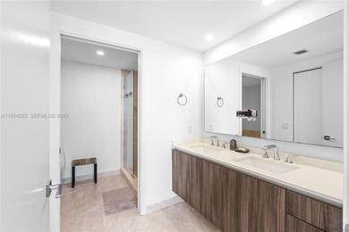 Welcome to Unit 4309 at Aria on the Bay -- a bright and spacious