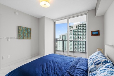 Welcome to Unit 4309 at Aria on the Bay -- a bright and spacious