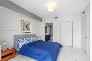 Welcome to Unit 4309 at Aria on the Bay -- a bright and spacious