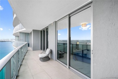 Welcome to Unit 4309 at Aria on the Bay -- a bright and spacious