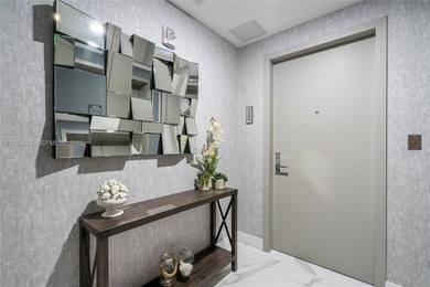 Welcome to Unit 4309 at Aria on the Bay -- a bright and spacious