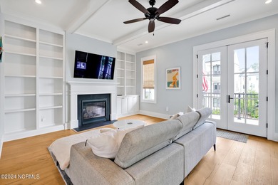 Welcome to an exquisite PBC designed townhome nestled in the