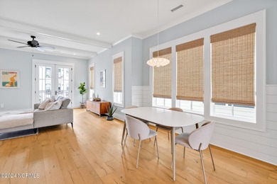 Welcome to an exquisite PBC designed townhome nestled in the