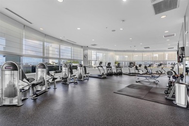 This stunning 1-bedroom, 1.5-bath condo with unobstructed South