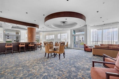 This stunning 1-bedroom, 1.5-bath condo with unobstructed South