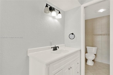 Beautiful corner unit at Kings Cove Condo with stunning lake