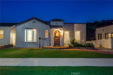Welcome to this beautifully renovated Spanish-style home