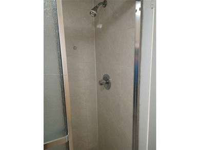 FIRST FLOOR CORNER UNIT 2 BEDROOMS 2 BATHROOMS CONDO IN WEST