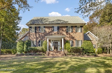 Gorgeous custom-built brick home on a 0.71 acre lot on fairway