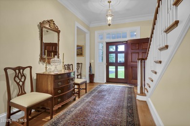 Gorgeous custom-built brick home on a 0.71 acre lot on fairway