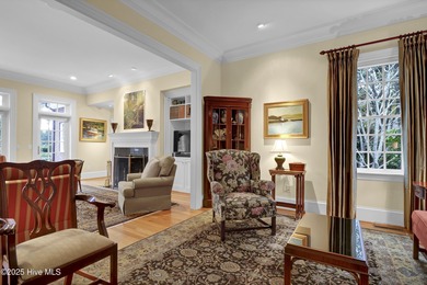 Gorgeous custom-built brick home on a 0.71 acre lot on fairway