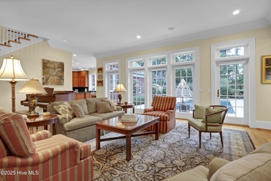 Gorgeous custom-built brick home on a 0.71 acre lot on fairway