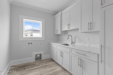 Experience the best of coastal living in this newly completed