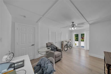 Welcome to this charming and well-maintained 3-bedroom + den