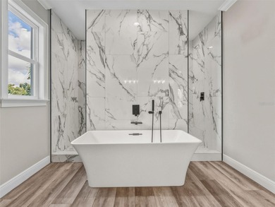 Experience unparalleled waterfront living in this brand-new