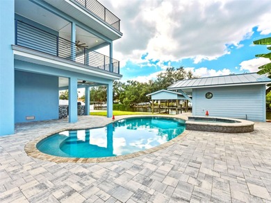 Experience unparalleled waterfront living in this brand-new