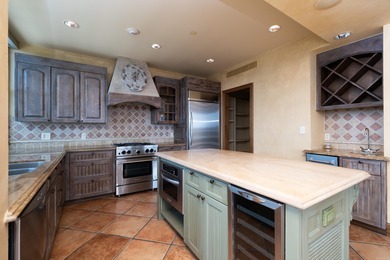 Unique, French Country, Beautiful High Rise Condo in the heart