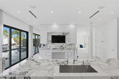 Gorgeous contemporary waterfront residence built in 2021 in the