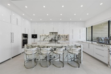 Gorgeous contemporary waterfront residence built in 2021 in the