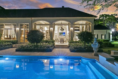 This timeless Euoprean Estate Home sits on 1.6 acres in the