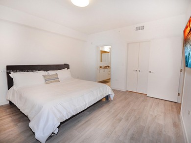 Freshly painted and income-ready, this fully furnished 2/2 in