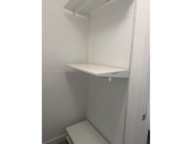 Freshly painted and income-ready, this fully furnished 2/2 in