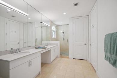 Experience luxury waterfront living in this impeccably