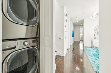 Experience luxury waterfront living in this impeccably