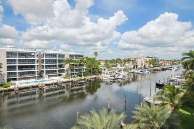 Experience luxury waterfront living in this impeccably