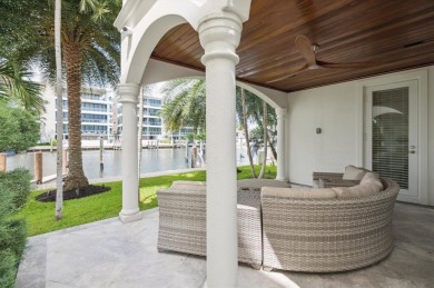 Experience luxury waterfront living in this impeccably