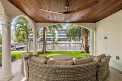 Experience luxury waterfront living in this impeccably