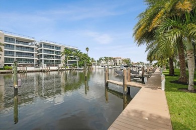 Experience luxury waterfront living in this impeccably