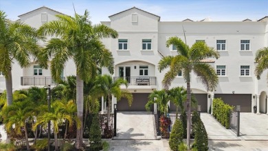 Experience luxury waterfront living in this impeccably