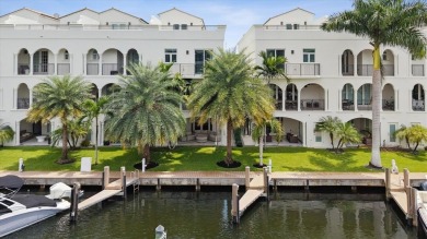 Experience luxury waterfront living in this impeccably