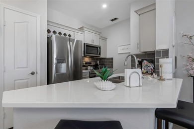 Stunning renovated end-unit condo is located next to the