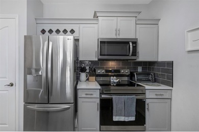 Stunning renovated end-unit condo is located next to the