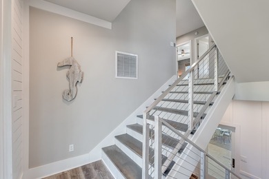 Located directly on the Gulf of America, Singing Waves (formerly