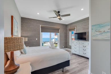 Located directly on the Gulf of America, Singing Waves (formerly