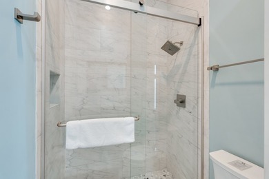 Located directly on the Gulf of America, Singing Waves (formerly