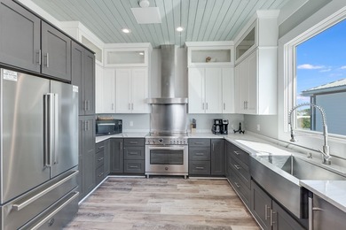 Located directly on the Gulf of America, Singing Waves (formerly