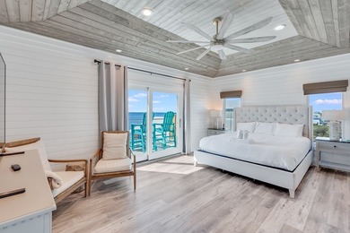 Located directly on the Gulf of America, Singing Waves (formerly