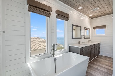 Located directly on the Gulf of America, Singing Waves (formerly