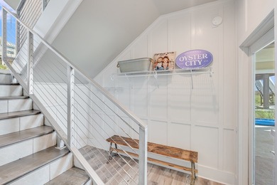 Located directly on the Gulf of America, Singing Waves (formerly