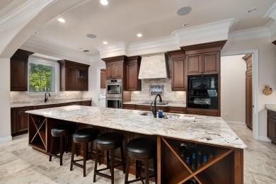 Located in the highly sought-after, privately gated community of